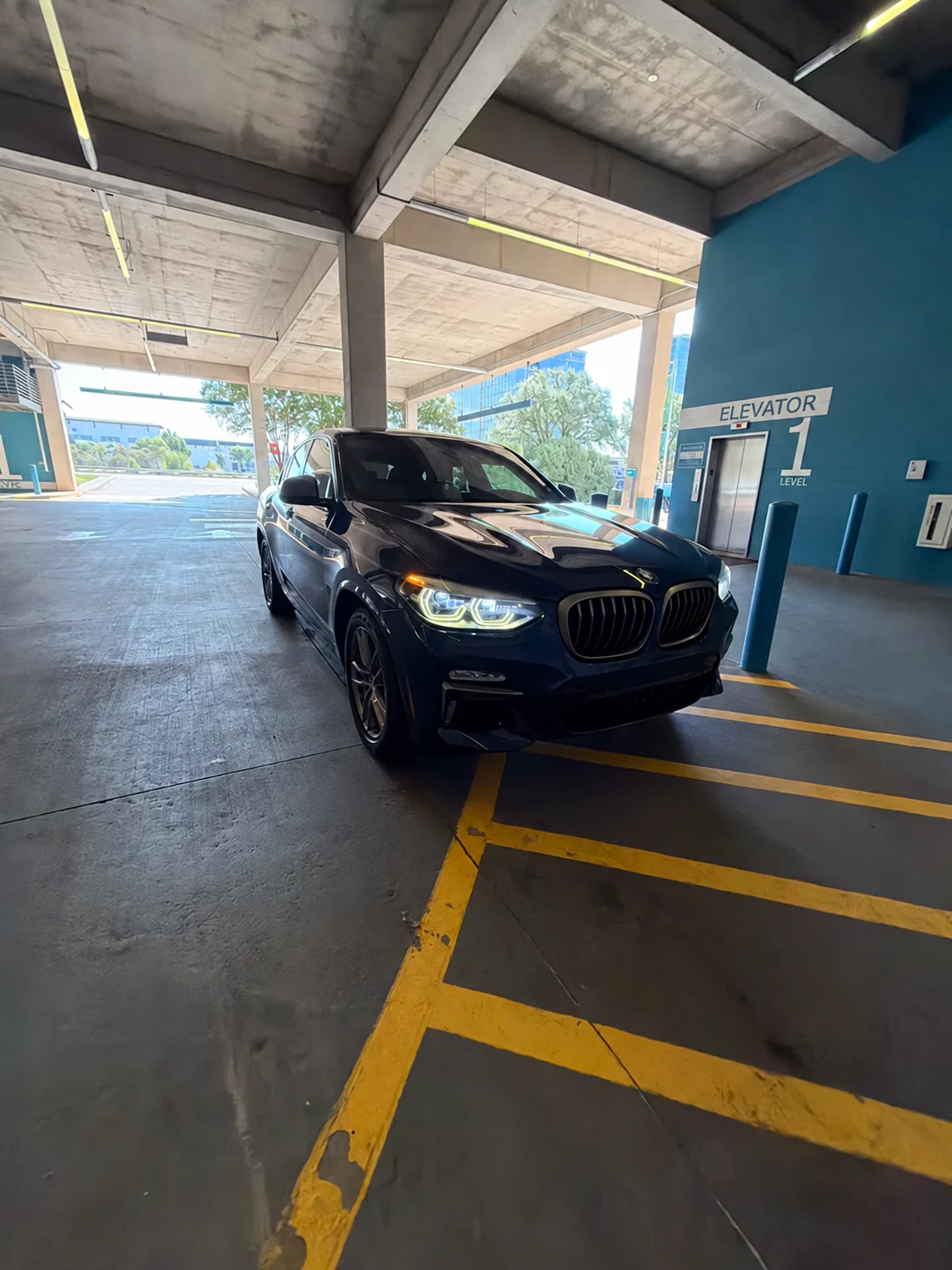 BMW X4 in covered parking